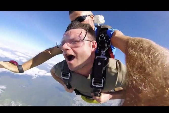 Cairns: Tandem Skydive Experience over Reef & Rainforest - The Jump Itself: Freefall, Then Quiet Under Parachute