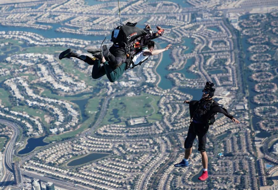 Dubai: Skydive at The Palm with Photos, Video & Yacht Tour - What you’ll see: Palm Jumeirah, dunes, and skyline geometry